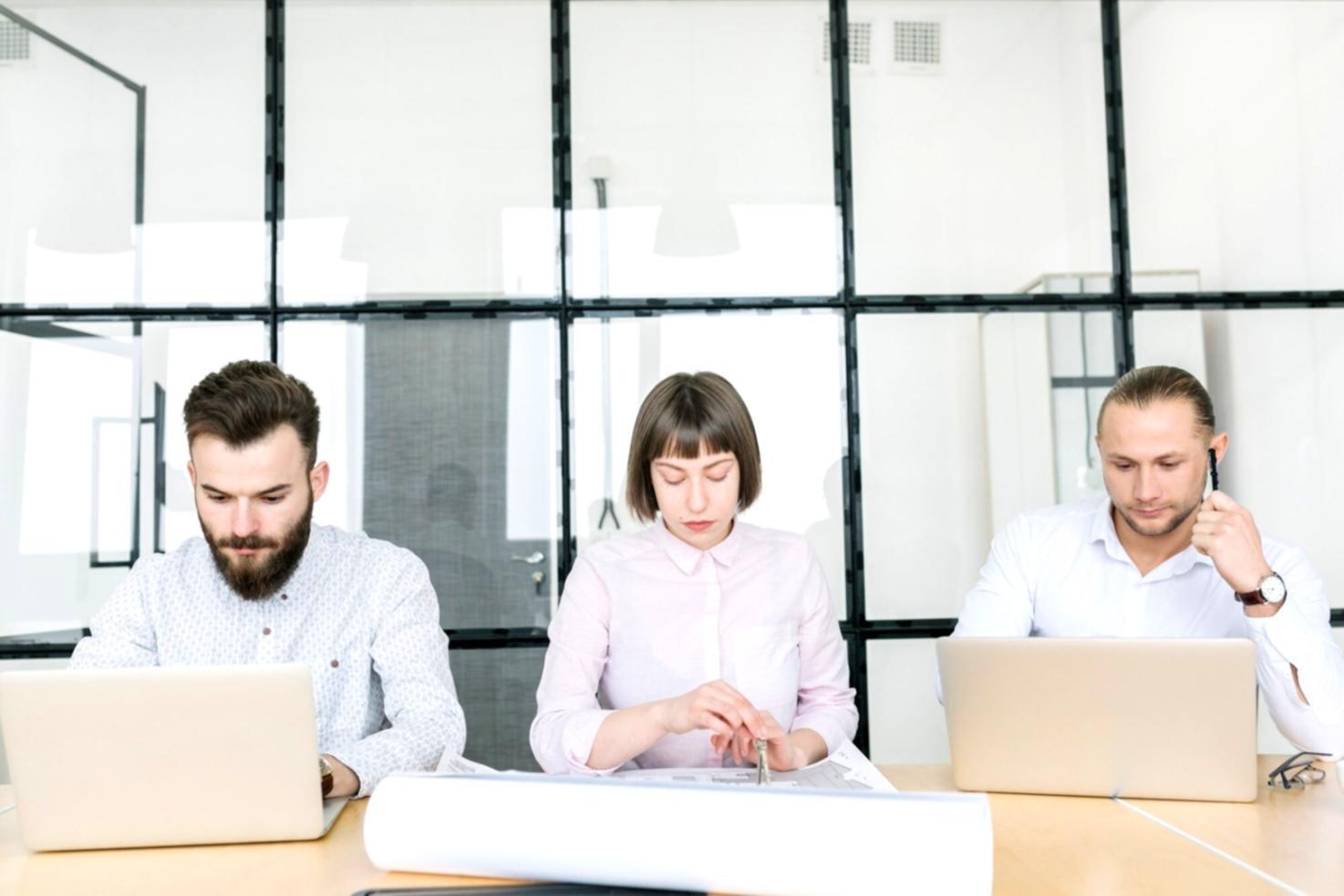 Workshop participants reviewing budget planning materials